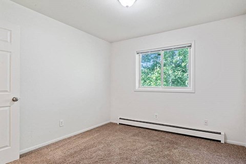 Bedroom with window at ReNew Eagle River, Eagle River