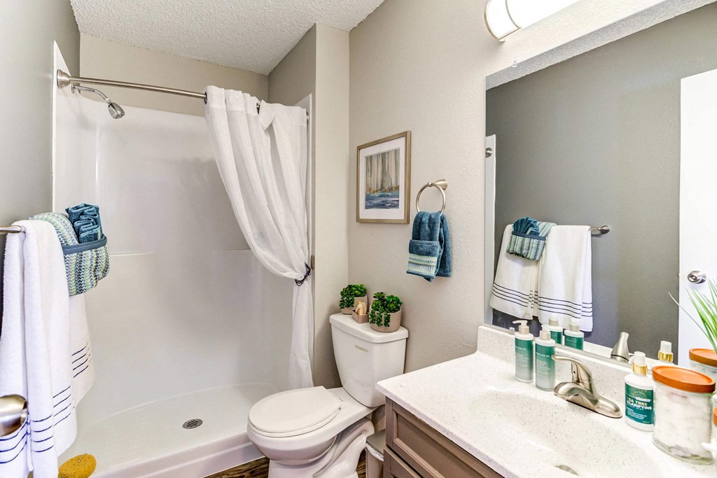 our apartments offer a bathroom with a bathtub  at ReNew at Neill Lake, Eden Prairie, MN