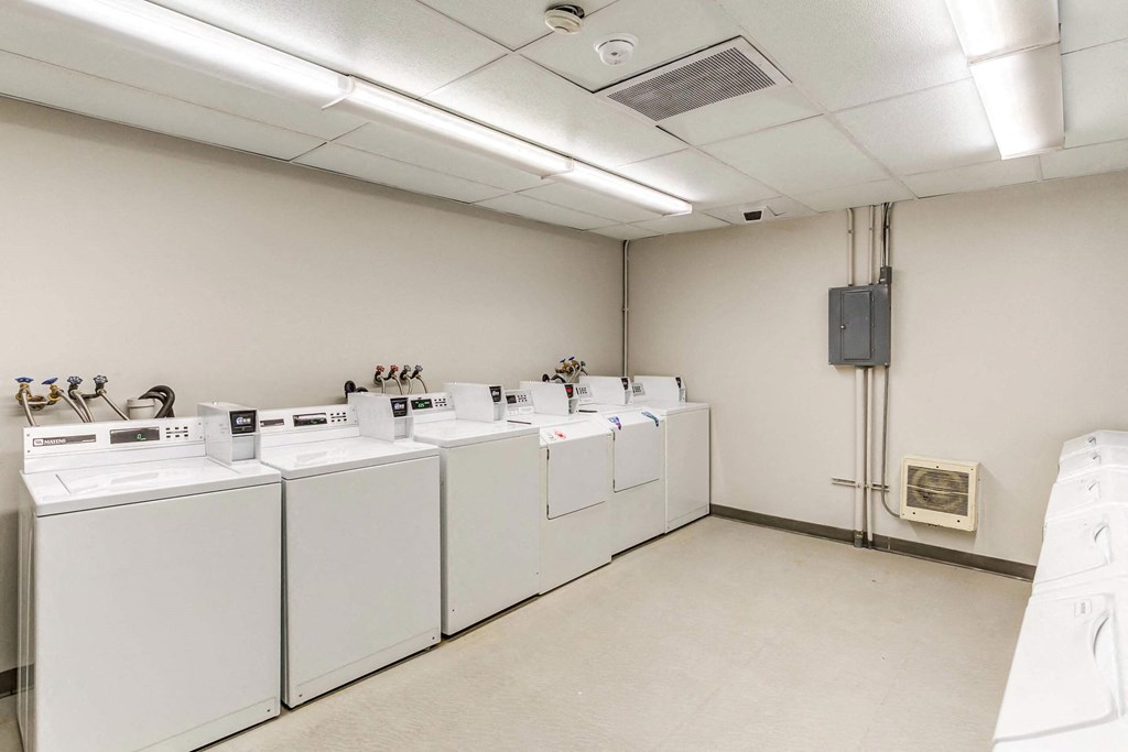 a large laundry room with washers and dryers  at ReNew at Neill Lake, Minnesota