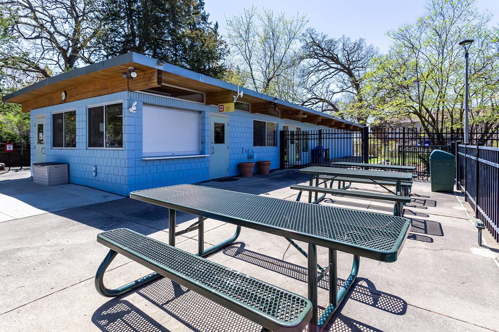 our picnic tables are conveniently located in front of the building  at ReNew at Neill Lake, Eden Prairie, Minnesota
