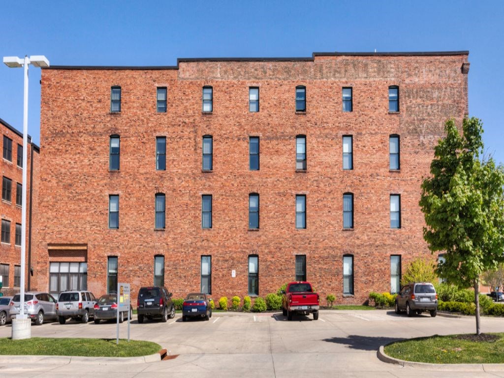 Exterior building view at Rocket Transfer Lofts, Des Moines, IA