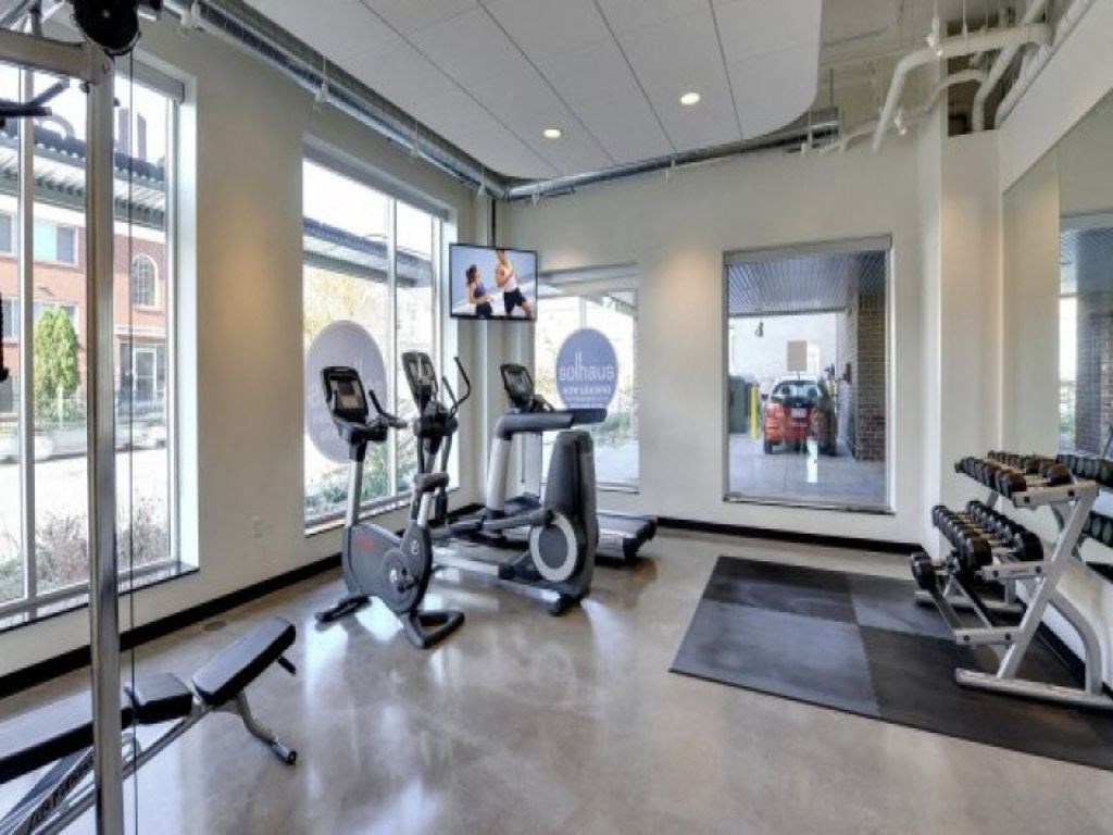 the gym at the residences at green valley one