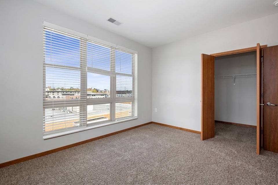 Bedroom with closet at 1910 on Water, Milwaukee, Wisconsin