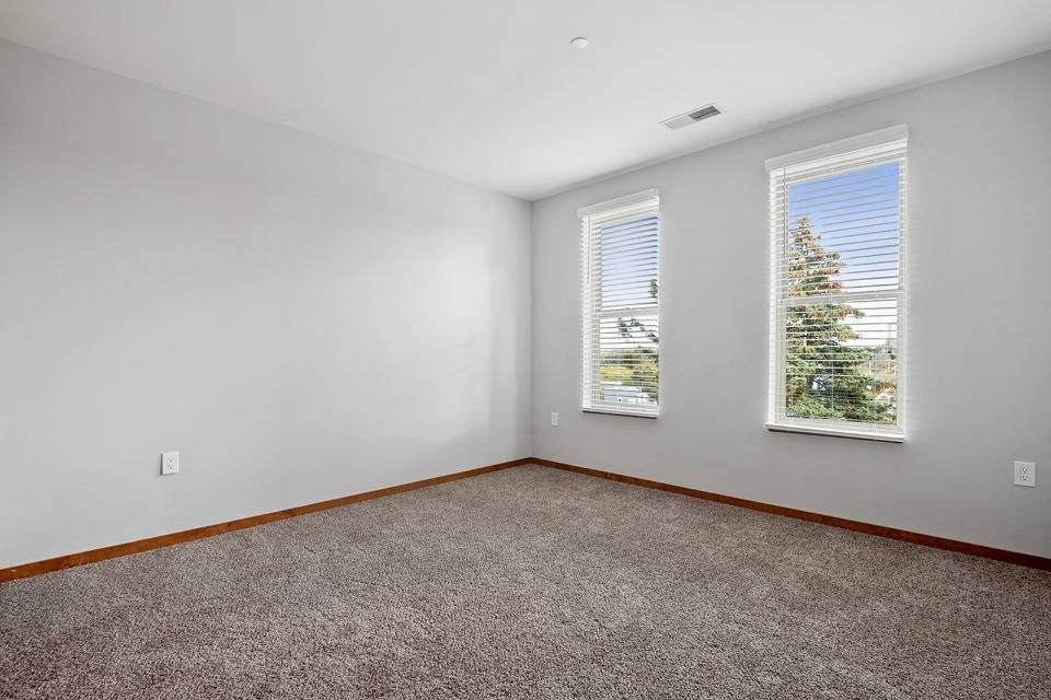 Bedroom with window view and ceiling light at 1910 on Water, Wisconsin, 53202