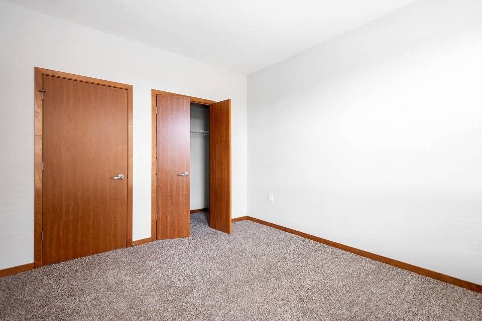 Bedroom with closet and bathroom at 1910 on Water, Milwaukee
