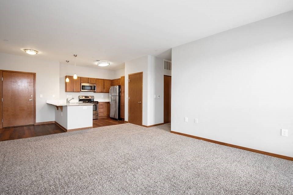 Living room and kitchen at 1910 on Water, Milwaukee, WI