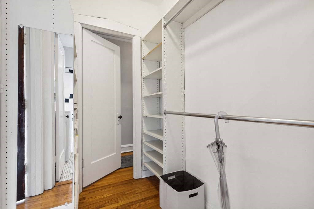 a room with a closet and a trash can in it at The Bryant at Oak Park I & II, Oak Park, IL 60302