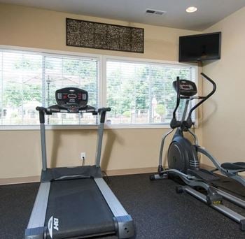 our gym is equipped with a treadmill and a tv at Sundial Apartments, Wilsonville, OR