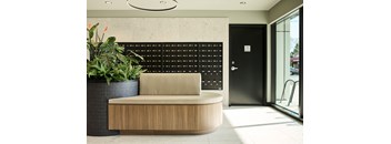 A black door with a glass window is on the right side of the image.