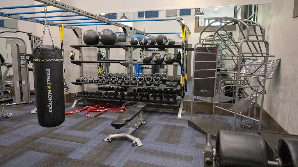 Wynnwood Vinings Atlanta fitness room with weights and a punching bag