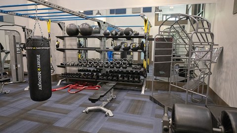 Wynnwood Vinings Atlanta fitness room with weights and a punching bag