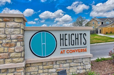 heights at converse apartments entrance sign
