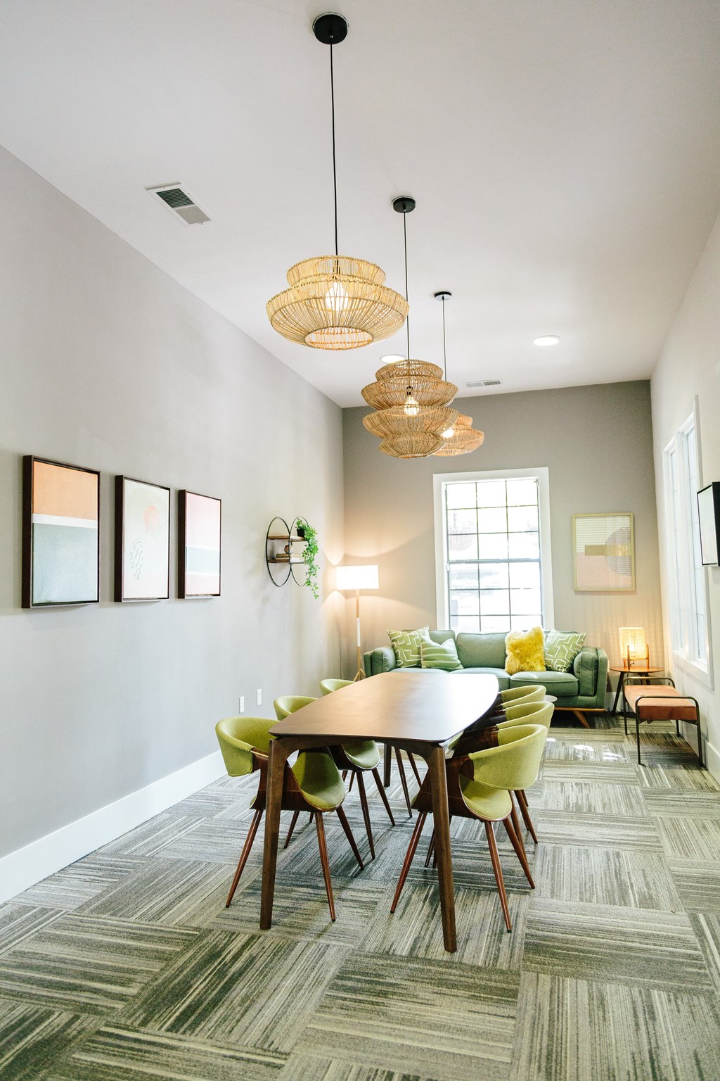 community coworking table in the business center at Tapestry at Hollingsworth Park