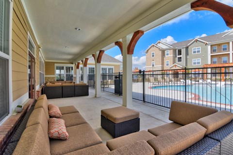 the preserve at ballantyne commons poolside living area with couches and tables