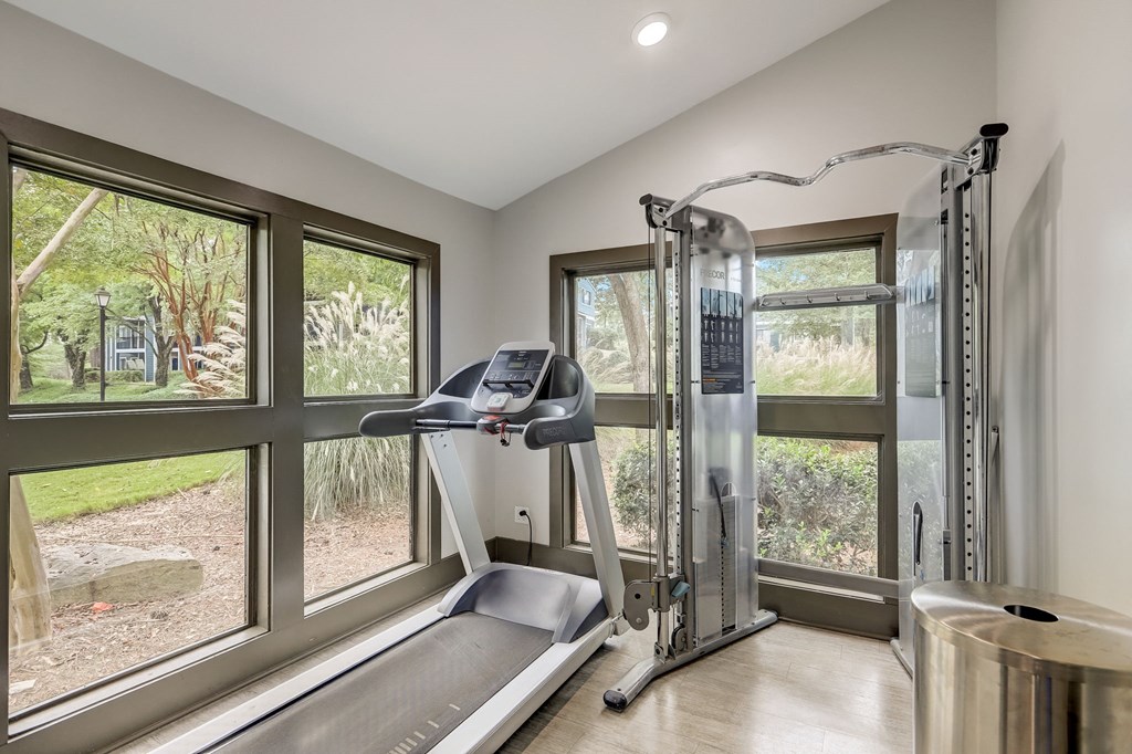Wynnwood Vinings Atlanta fitness center room with windows and a treadmill