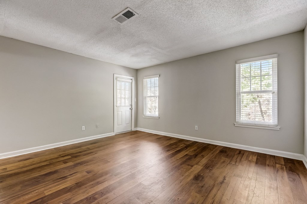 hardwood floors in a spacious living room at Veridian at Sandy Springs