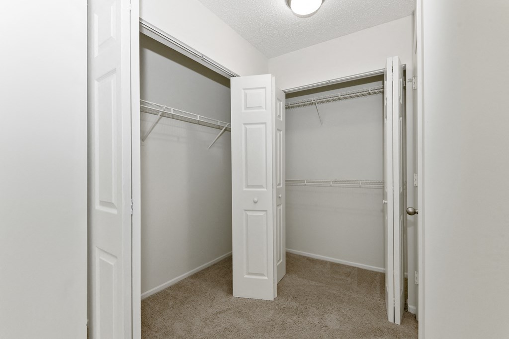 a spacious closet in a bedroom at Canopy at Baybrook apartments in Charlotte NC