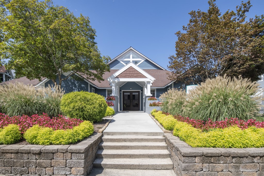 a house with a garden in front of it