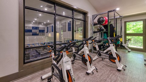 Wynnwood Vinings two story fitness center interior room filled with lots of bikes and exercise equipment