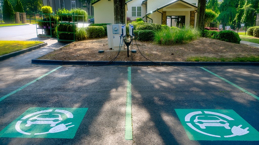 an electric vehicle charging station in front of a house