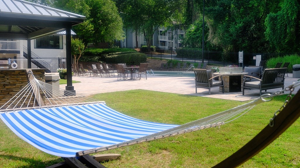 a hammock in a backyard