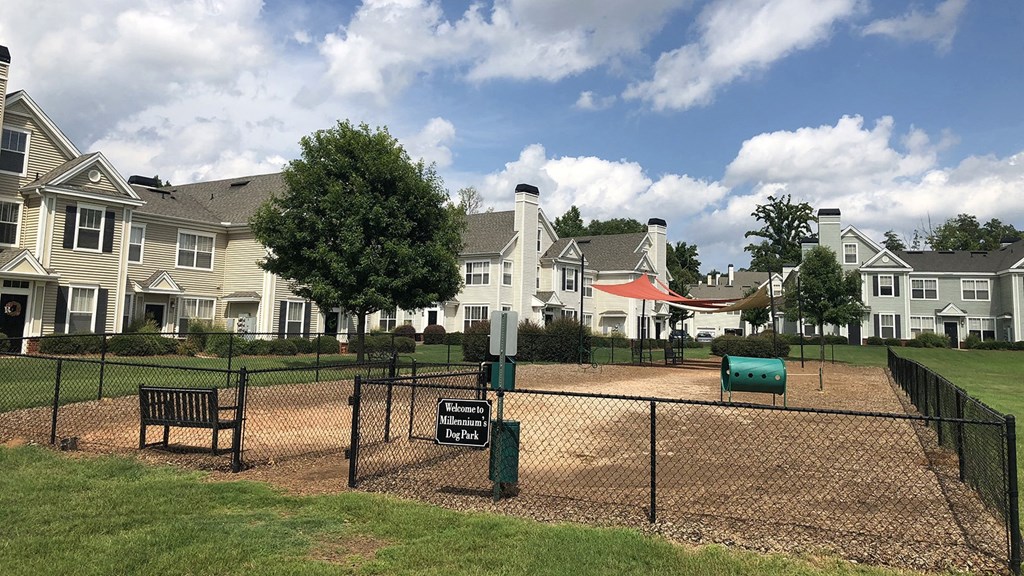 a fenced in dog park at Millennium Apartments Greenville SC