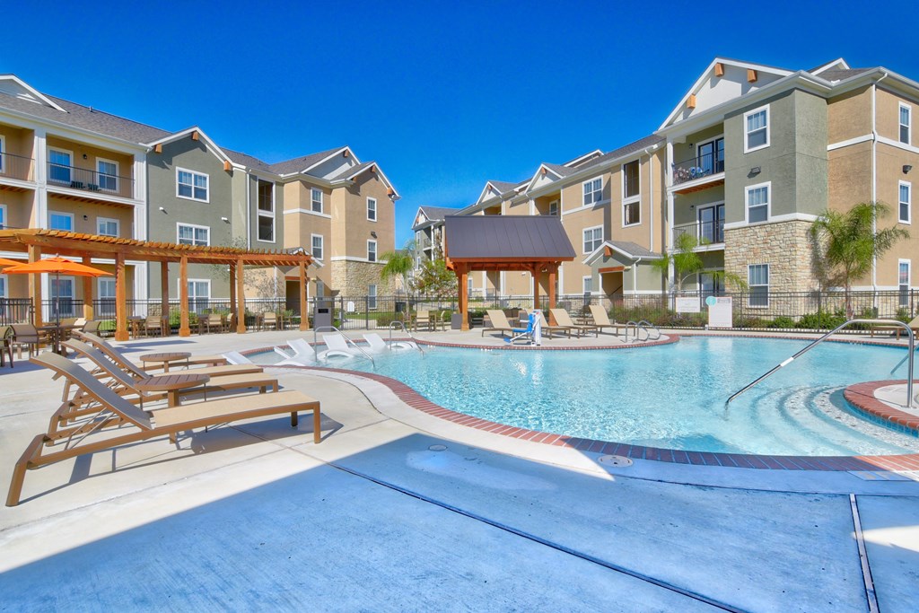 heights at converse apartments in texas pool area with lounge seating