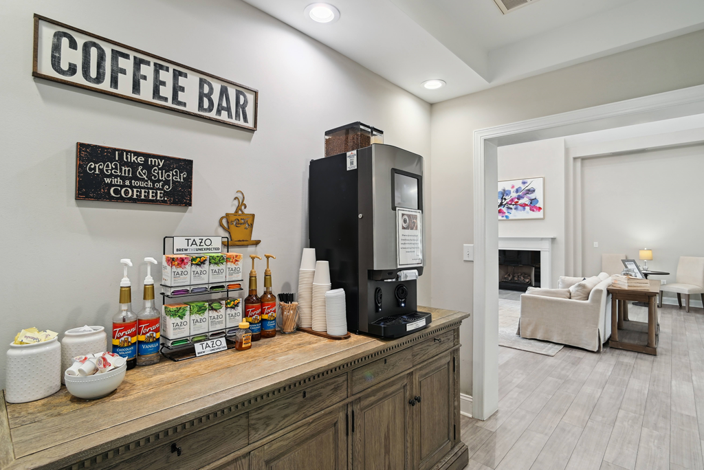 the lobby of a coffee bar with a coffee machine