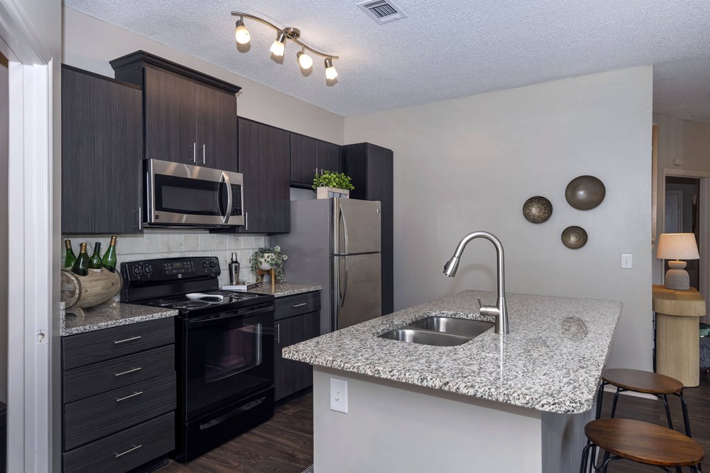 modern kitchen at Seasons at Umstead apartments in Raleigh