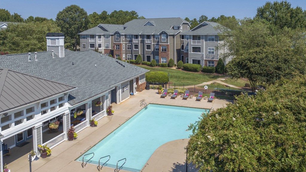 Arial view of Seasons at Umstead apartments in Raleigh with pool and lounge chairs