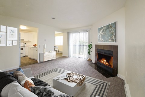 a living room with a fireplace and a couch