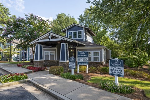 The front entrance to leasing office at Wynnwood Vinings with a Future Resident parking sign