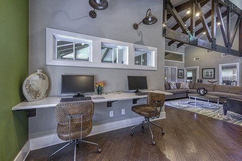 office computers station with two desks and two computer monitors at Wynnwood Vinings Leasing center Tamarron Pkwy SE Atlanta GA