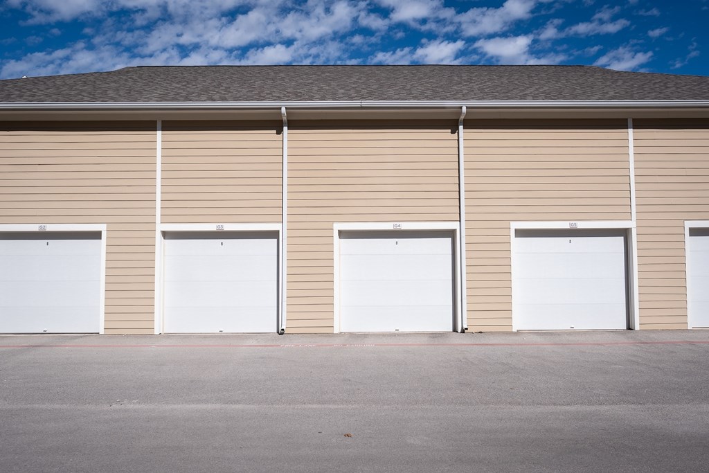 A building with four garage doors.