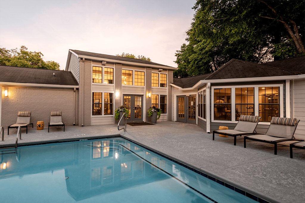Eclipse Apartments Duluth GA resident pool and fitness center at sunset
