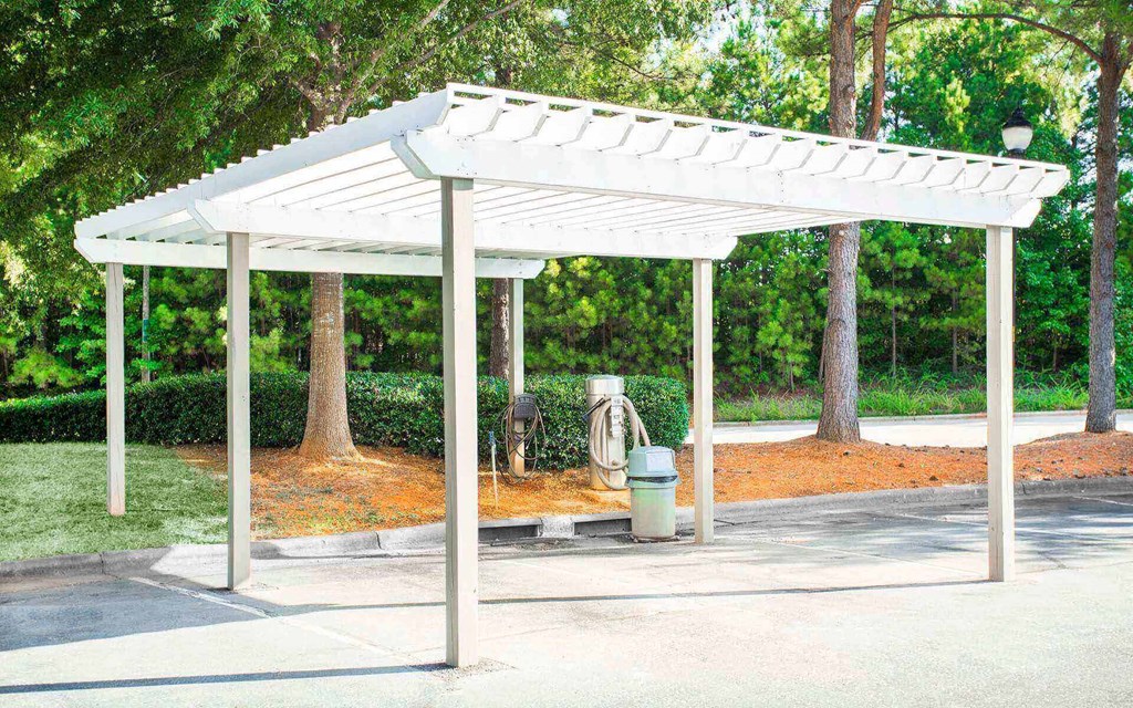 the car care area at Seasons at Umstead apartments in Raleigh with a vacuum