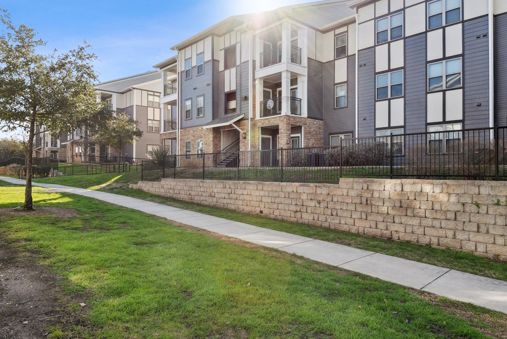 the preserve at ballantyne commons apartments walkway to exterior of apartments