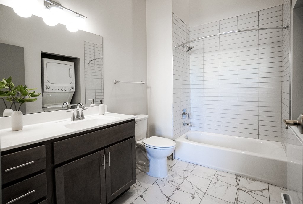 bathroom in studio apartment at Myers Medical Lofts