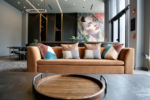 a living room with a couch and a table