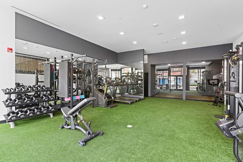 the gym at the flats at big tex apartments