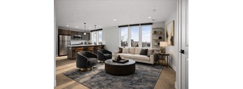 A modern living room with a large window and a view of the city.