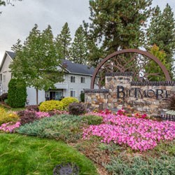 Biltmore Sign with flowers and grass in front of building