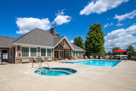 Country Vista at Liberty Lake with swimming pool with the clubhouse in the background