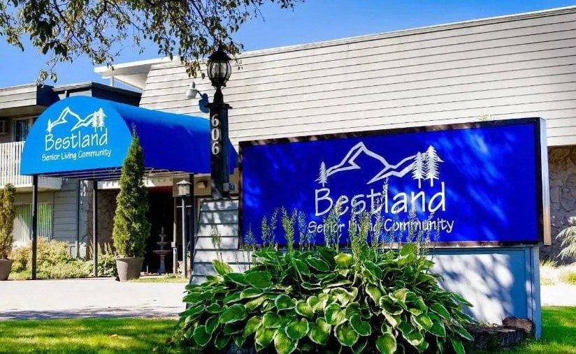 a building with a blue sign on the side of it