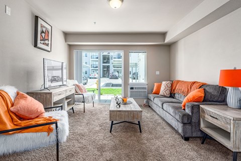 a living room with a couch and a table