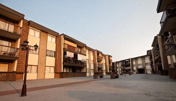 a street filled with lots of buildings next to each other