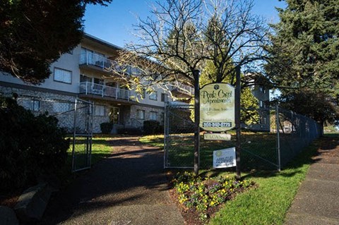 a large building with a sign in front of it