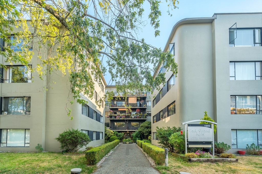 A pathway leads to a sign that says "The Park".