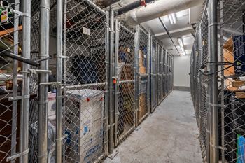 A long corridor with metal fences on both sides.