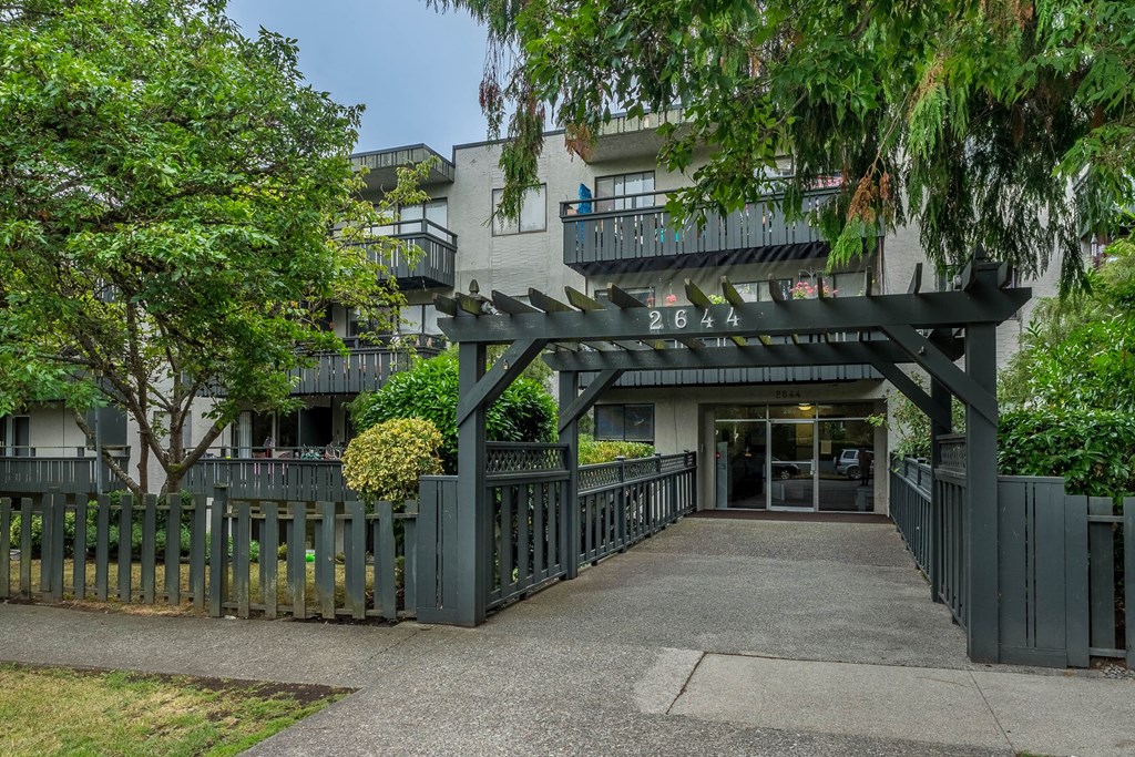 A black gate with the number 2644 on it.